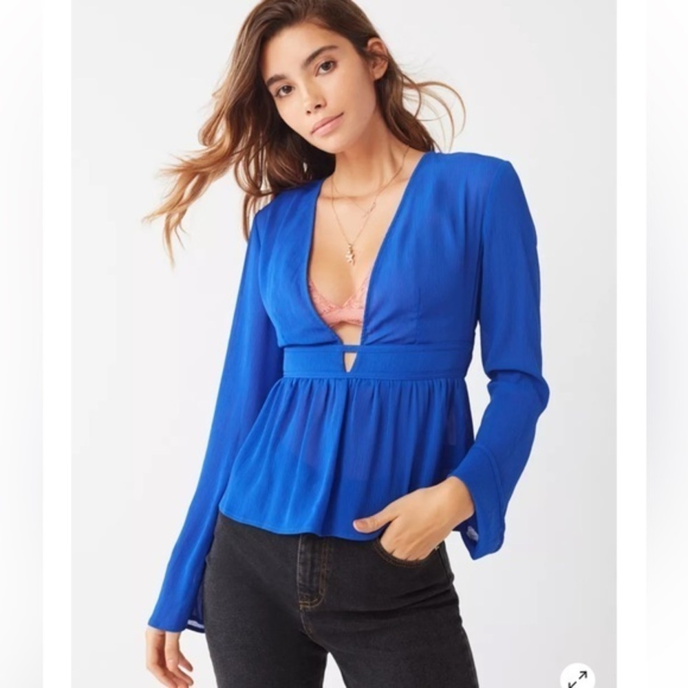 Urban Outfitters by Free People
UO Deep V Open-Back Blouse Blue
Peplum Top